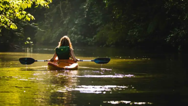 How hard is Kayaking - girl kayaking in a river
