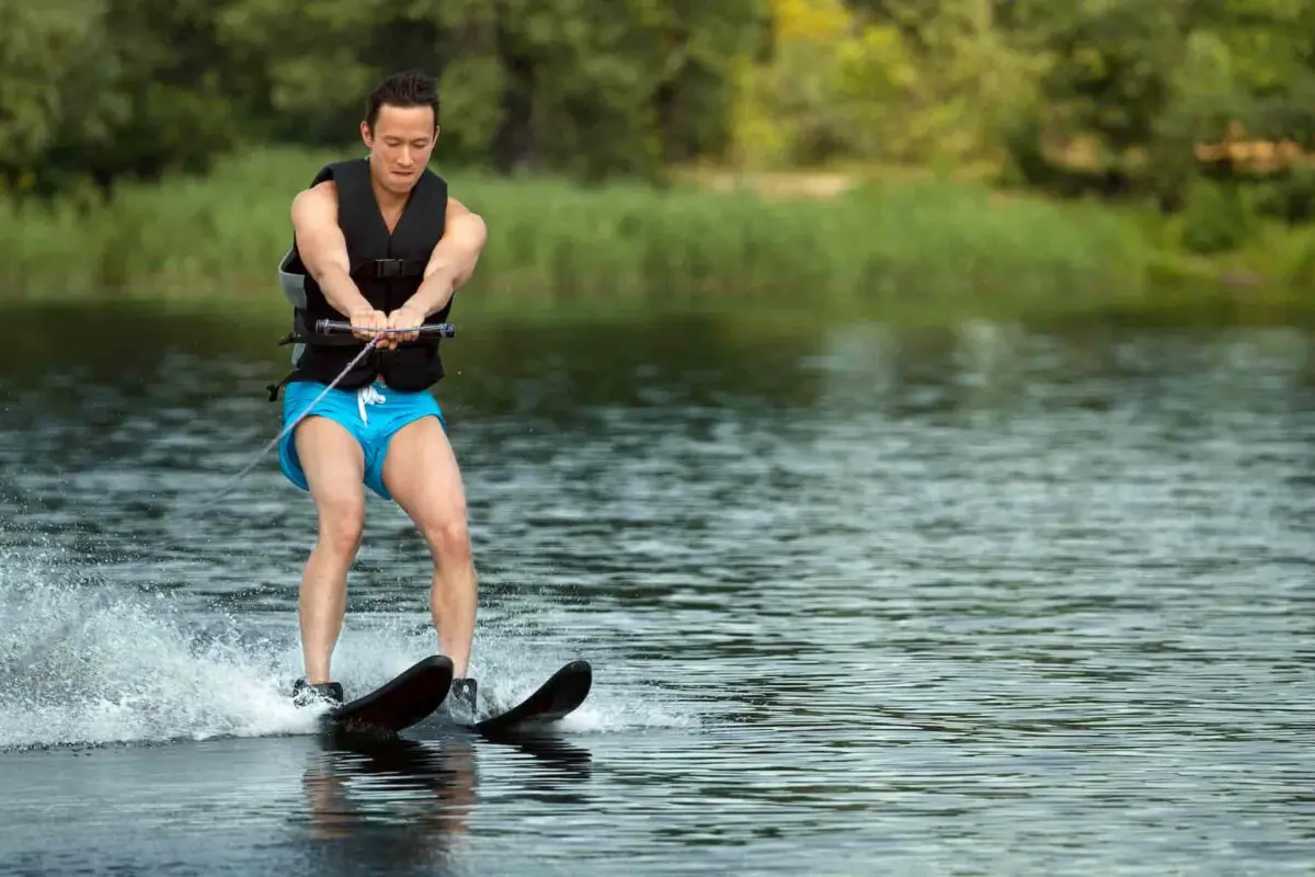 how to start water skiing - guy nervous as he stands on water skis